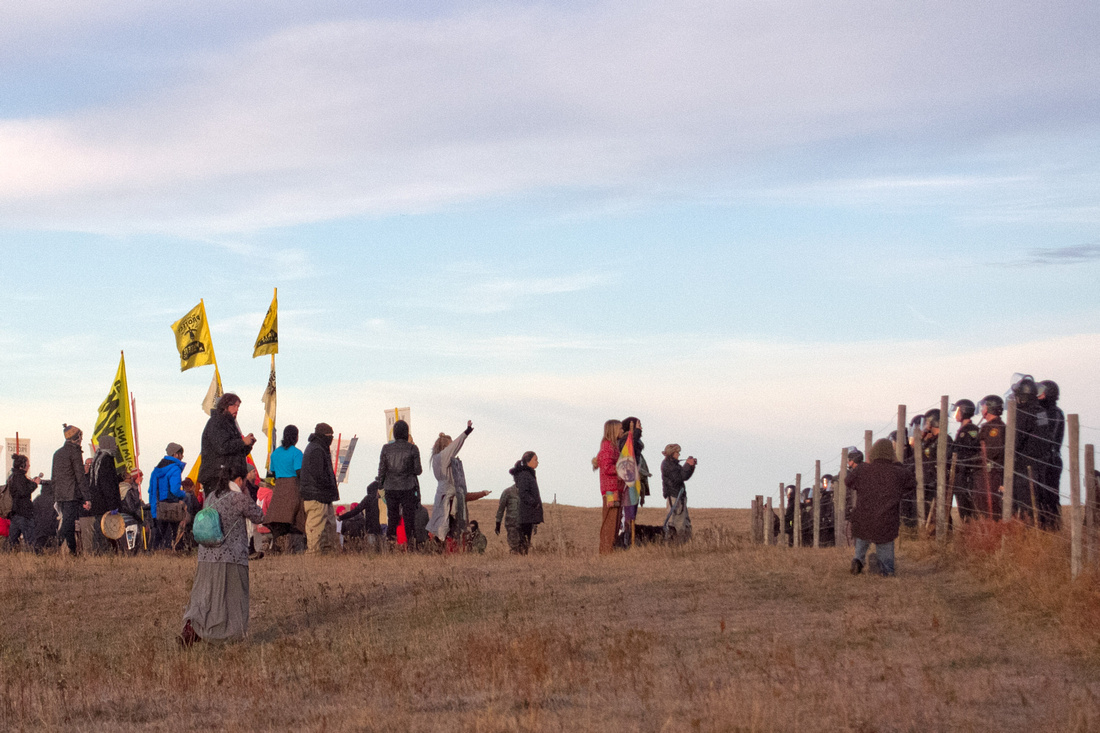 Native American Water Protectors and their supporters clash with police as they reach the DAPL construction site. Approximately 80 DAPL Resistance members were arrested.